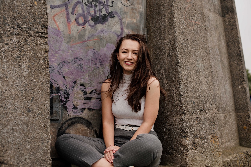 Amelia Clarkson sitting down