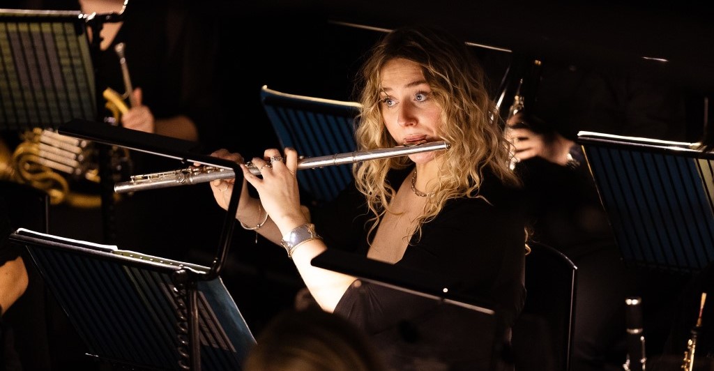 A RNCM student plays a flute.