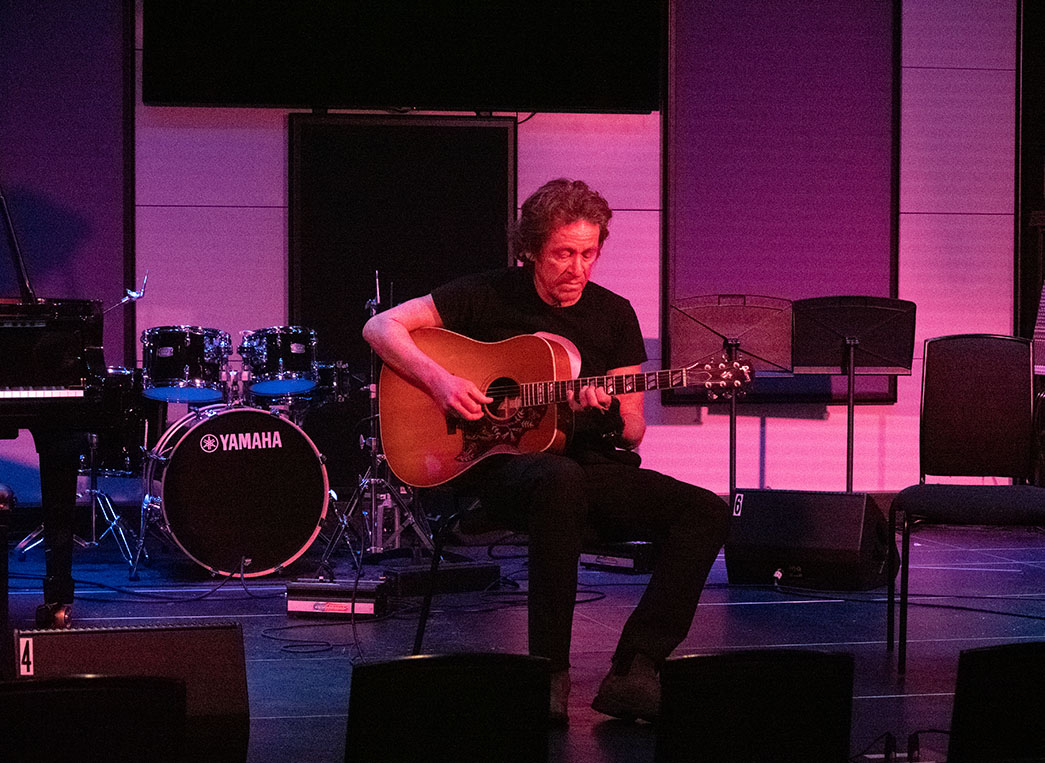 Dominic Miller playing guitar