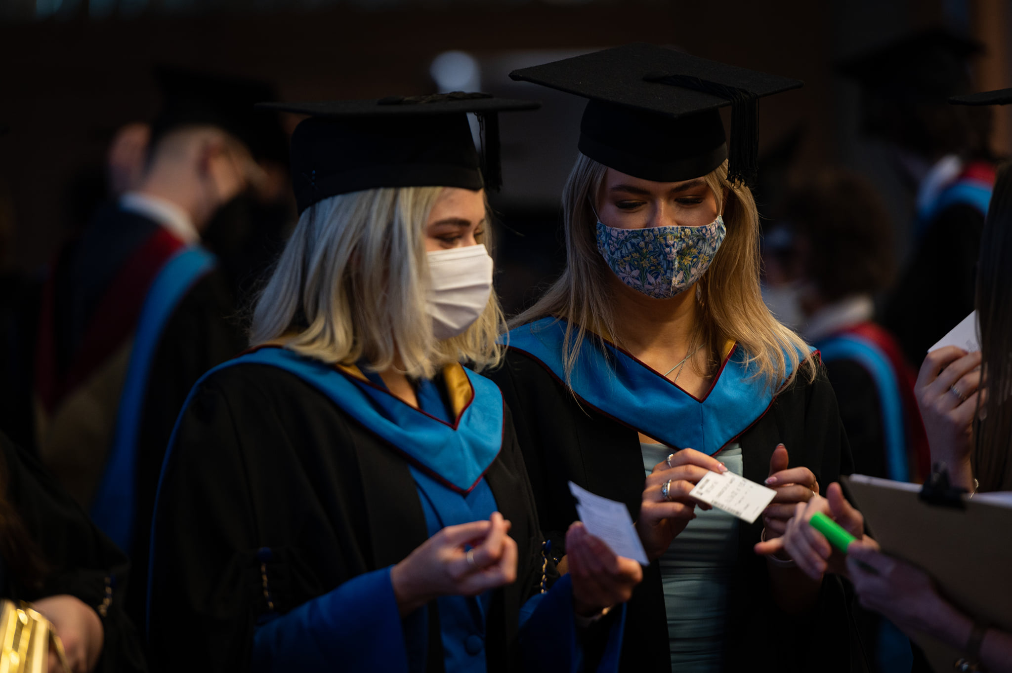 Students in masks at graduation