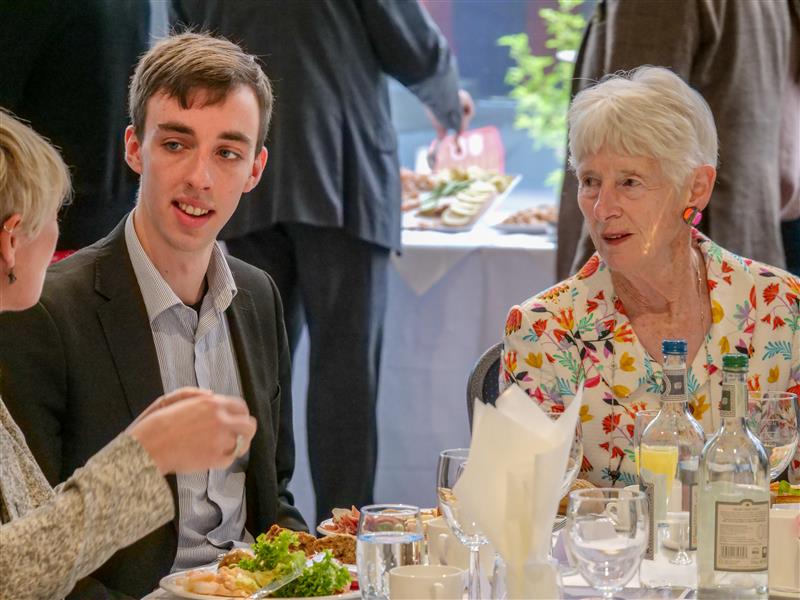 Jean Oglesby (right) meets with students and staff at the RNCM