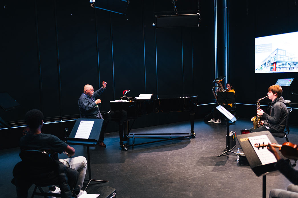 RNCM Pathfinders taking class in RNCM Theatre.