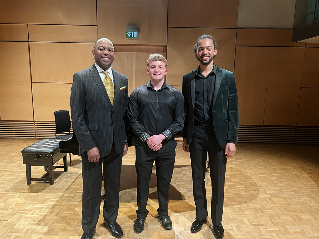 Brennan Alleyne (tenor, right) and Alex Bradford (pianist, middle) with RNCM professor Michael Harper, founder of the Williams-Howard Prize.