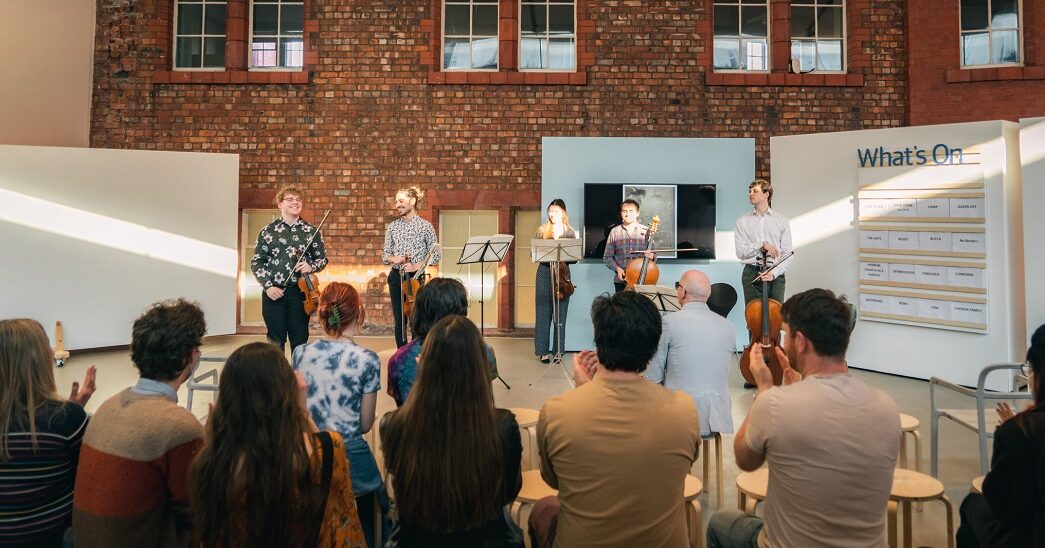 Students performing at the Whitworth Art Gallery