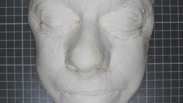 Old cast of a face made of plaster.