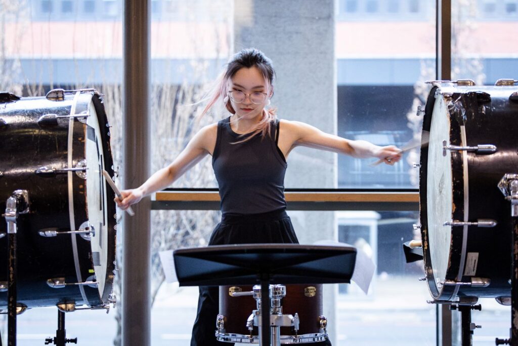 Student playing drums