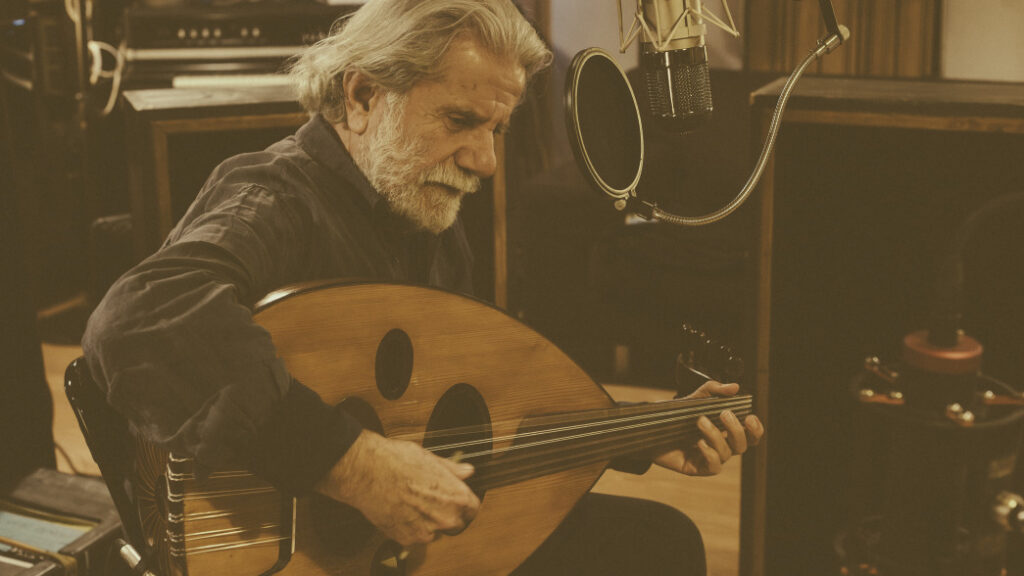 Publicity image of Marcel Khalife in sepia tone